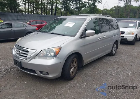 2010 Honda Odyssey Touring from USA, damaged, VIN 5FNRL3H9XAB090134